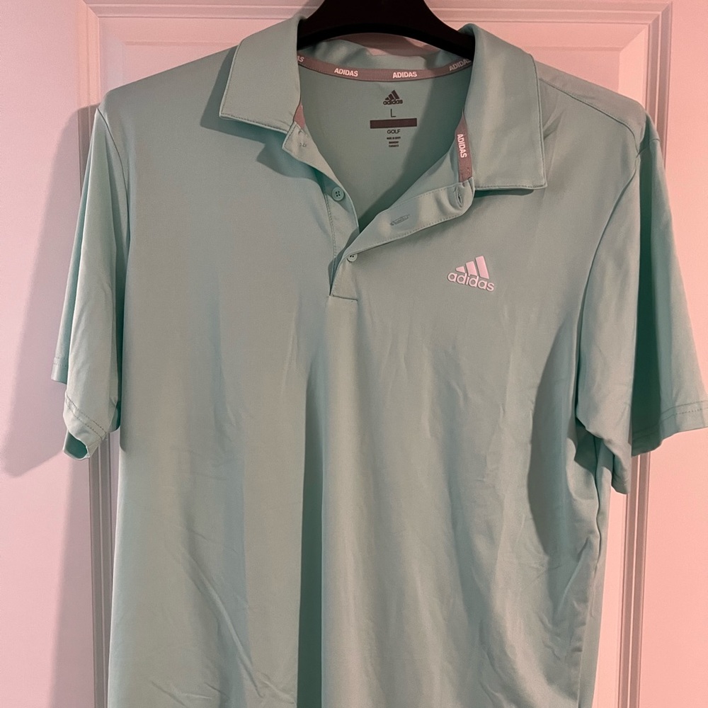 Men’s large adidas golf shirt new without tags.
